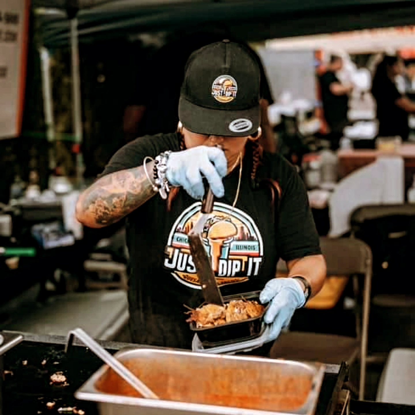 Just Dip It taquero plating birria tacos to order